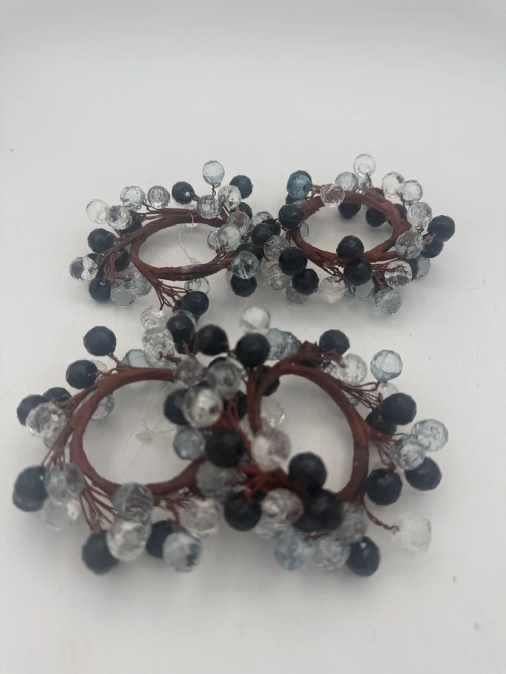 Cluster of  black / clear beaded Napkin Rings holders set of 4